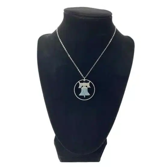 Franklin Half Dollar Necklace Reverse showing the Liberty Bell and Rim, Cut Coin Jewelry on black display image view-20562068