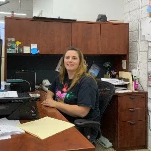 Flizzards staff working at office desk, image